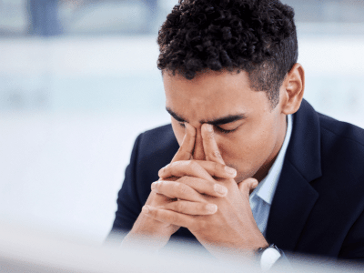 Man looking overwhelmed and anxious